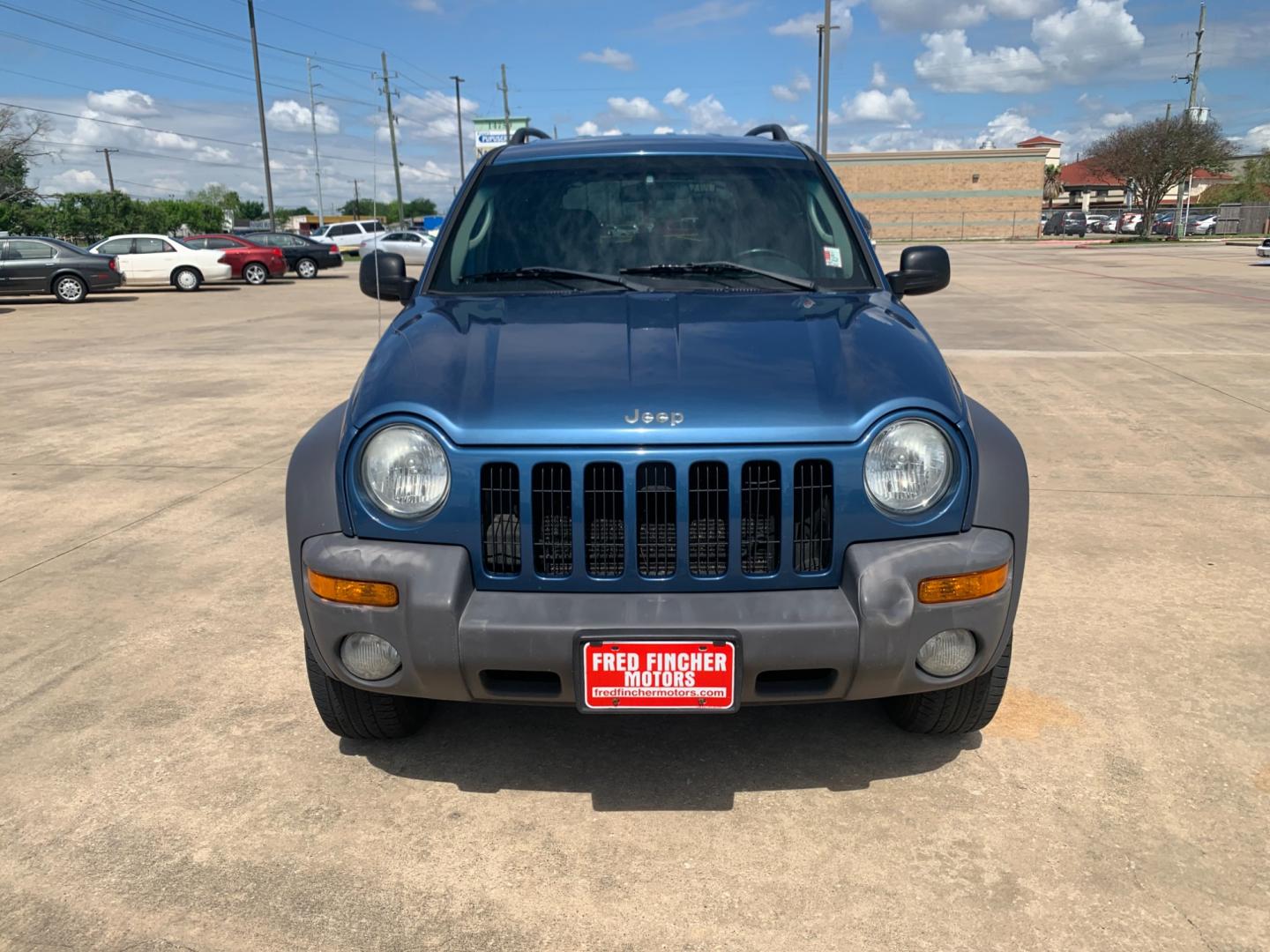 2004 blue /black Jeep Liberty Columbia Edition 2WD (1J4GK48KX4W) with an 3.7L V6 SOHC 12V engine, Automatic transmission, located at 14700 Tomball Parkway 249, Houston, TX, 77086, (281) 444-2200, 29.928619, -95.504074 - Photo#1